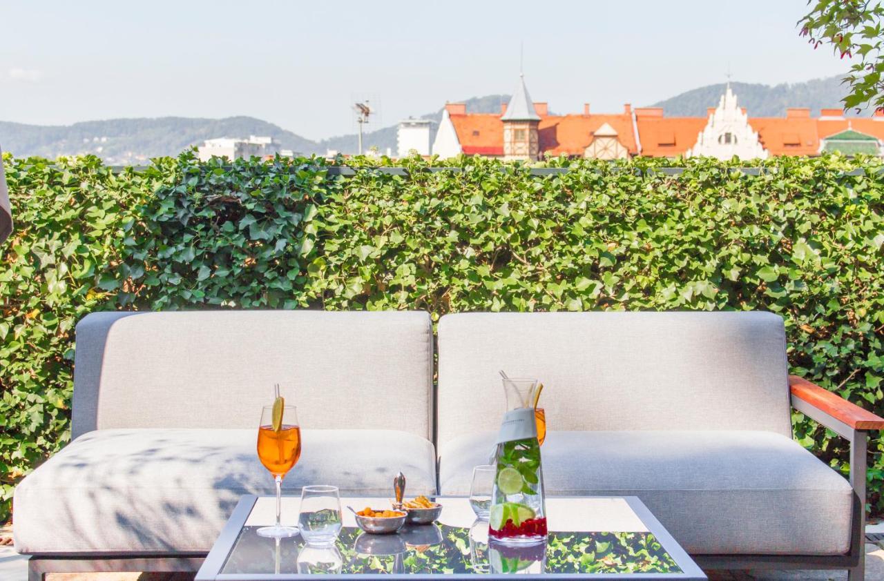Schlossberghotel Graz Exterior foto The rooftop terrace