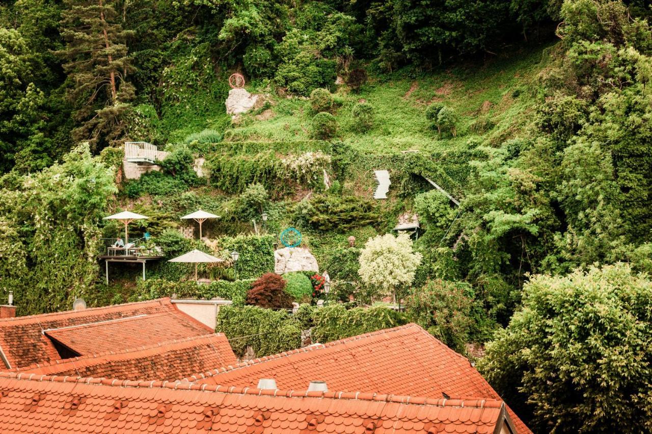 Schlossberghotel Graz Exterior foto The garden