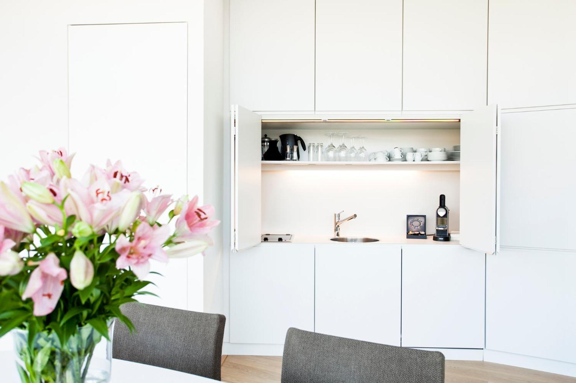 Schlossberghotel Graz Exterior foto A kitchen in a serviced apartment