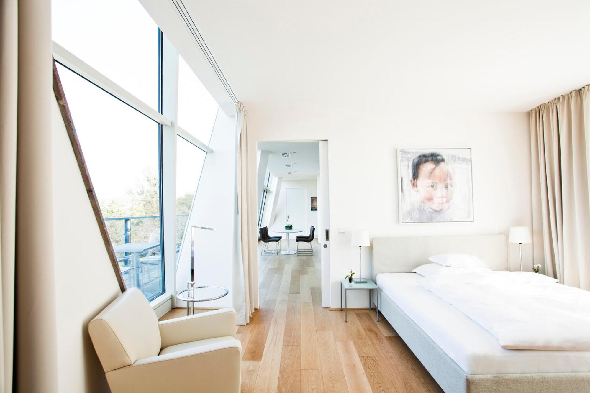 Schlossberghotel Graz Exterior foto A room at the Hotel Mandarin Oriental Munich